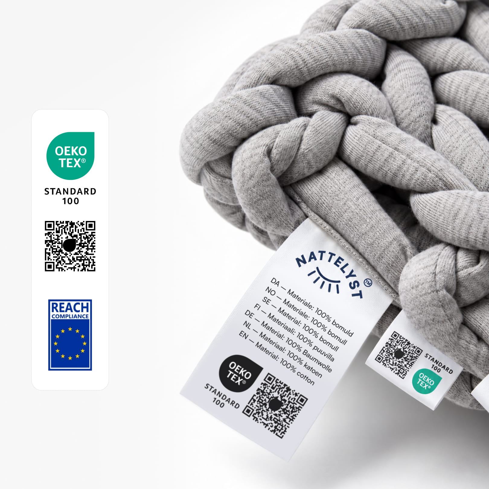Lysegrå strikket dyneknute med merkelapper og Oeko‑Tex- og REACH-sertifisering