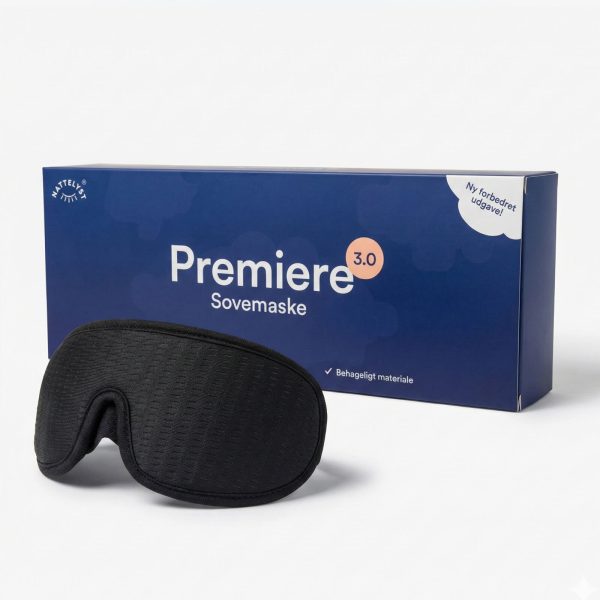 Sort kontureret sovemaske foran blå Premiere 3.0-æske, blødt polstret design til fuld lysblokering